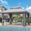 Vita 13 Ft. W x 10 Ft. D Steel Patio Gazebo with Soft Top Double Roof and Curtains