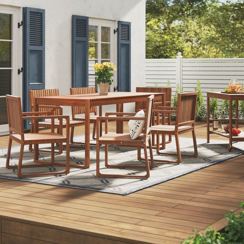 Crayton 6 - Person Acacia Solid Wood Patio Dining Set Rectangular Table with Cushions Included