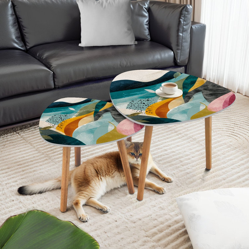Ensemble de 2 tables basses gigognes triangulaires à motif floral hawaïen contemporain
