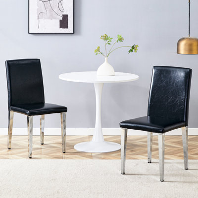 De 2 chaises de salle à manger en polyuréthane noir avec des pieds en métal argenté, un design de siège exquis et à la mode, une élasticité de coussin souple, - des pieds de corrosion 2, une éponge à haute élasticité orientée vers le confort minimaliste