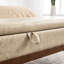 Repose-pieds confortable en laine avec espace de rangement dissimulé et pieds en bois robustes