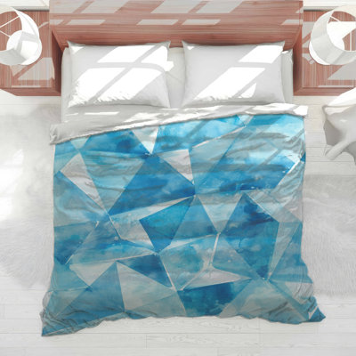 Édredon bleu à triangles géométriques