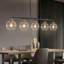 Lustre moderne à 5 lumières à intensité variable Spoutnik Lustre linéaire en verre transparent pour salle à manger