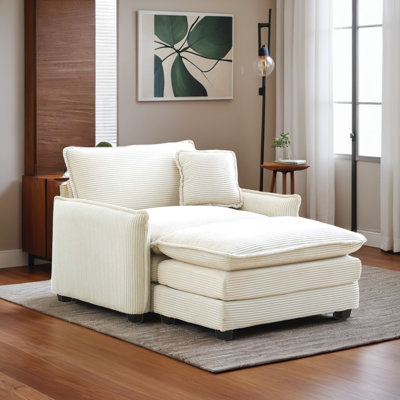 Canapé simple à siège profond avec repose-pieds et un coussin