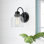Juliann 1-Light Dimmable Steel Wall Sconce with Clear Striped Glass Shade