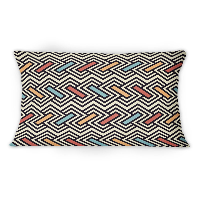 Coussin décoratif noir à motif zigzag noir et blanc avec motif à motif rouge et orange