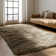 Blakes Solid Color Handmade Faux Sheepskin Area Rug in Beige