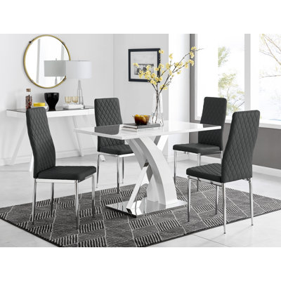 Ensemble de table de salle à manger Edzard en chrome et blanc ultrabrillant avec 4 chaises de salle à manger en similicuir de luxe