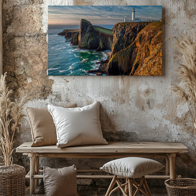 Canvas A Dramatic Coastal Scene Featuring Towering Cliffs Bathed In Warm Wall Art Golden Light The Rugged Rock Formations Exhibit Rich Canvas Wall Art
