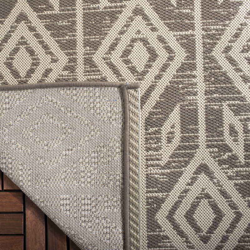Tapis d'intérieur / extérieur à motif géométrique Abdur Performance