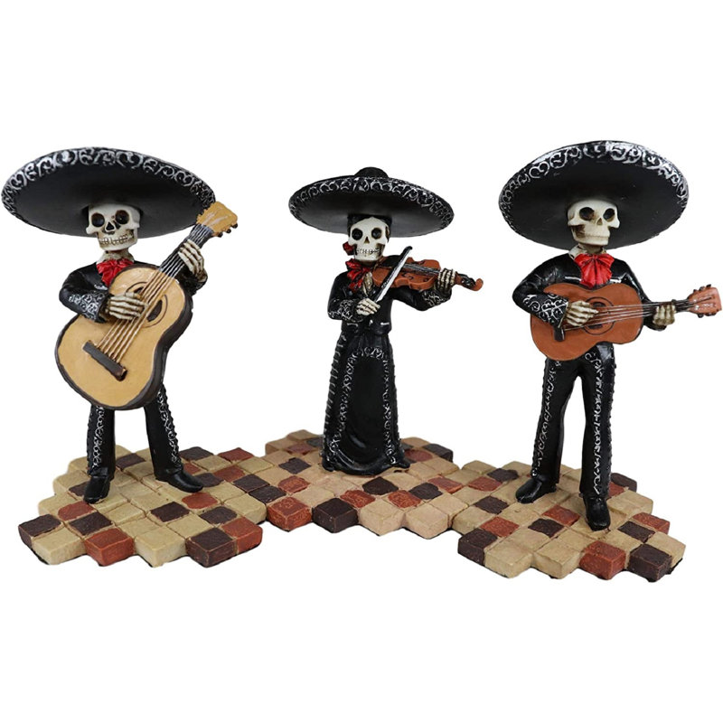 Figurine de guitare et violon squelette