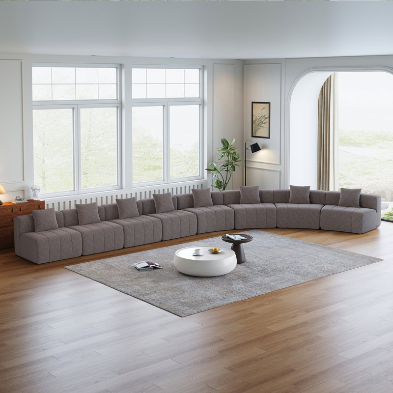 Canapé modulaire courbé en chenille avec 8 coussins, conception modulaire élégante et confortable pour les salons modernes