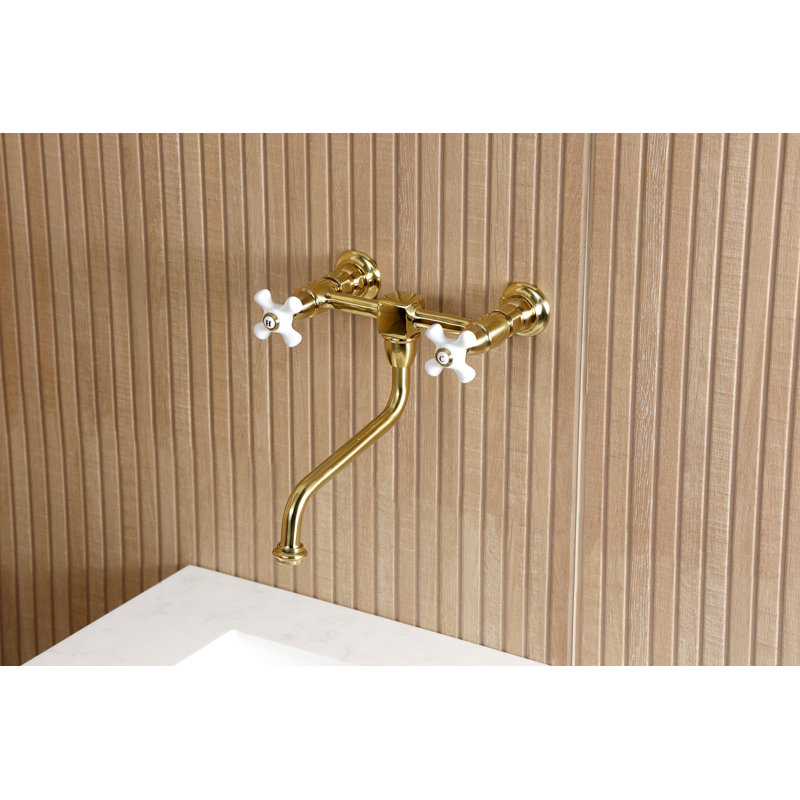 Kingston Brass Heritage Two-Handle 2-Hole Wall Mount Bathroom Faucet, Brushed Brass