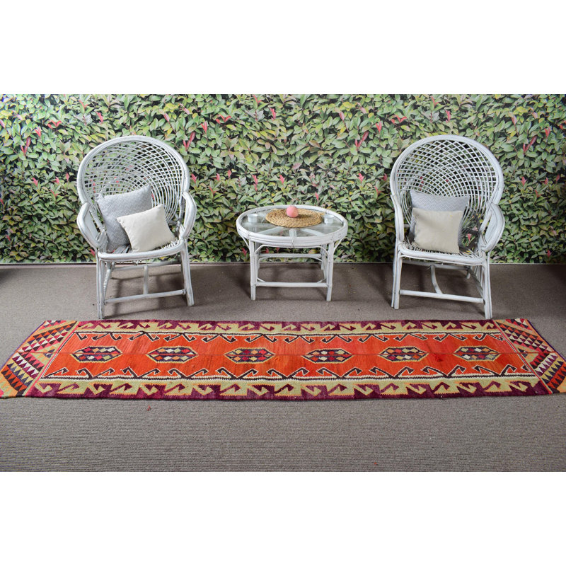 Tapis de style kilim turc fabriqué à la main en laine avec un design rétro et une teinte orange vibrante