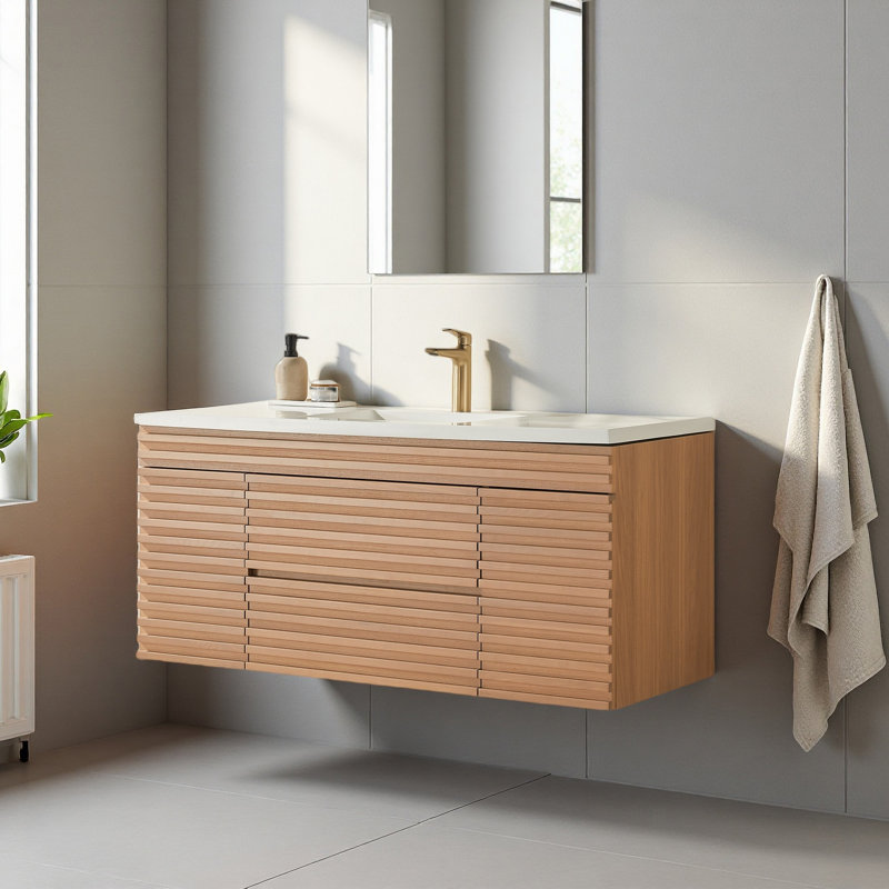 Meuble-lavabo mural avec lavabo simple en céramique, façade à lattes moderne, finition en bois naturel, tiroirs à fermeture en douceur pour la salle de bain