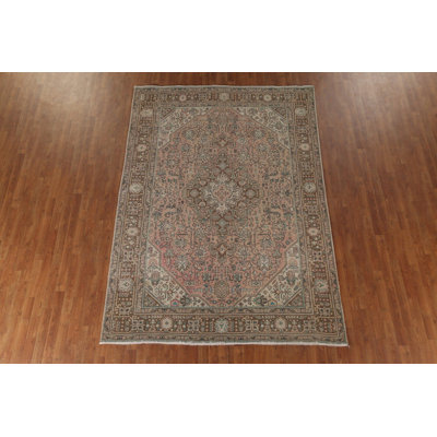 Tapis rose à motif géométrique traditionnel 7 x 10