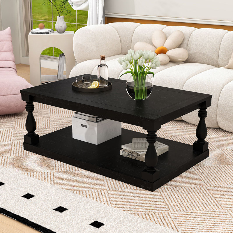 Table basse en bois rétro avec pieds en colonne et structure robuste, Noir