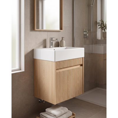 Meuble-lavabo suspendu en bois de 47 cm (18,5 po) avec lavabo réversible en résine et porte à ouverture simple pression