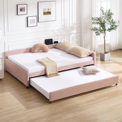 Lit de jour rembourré avec lit gigogne et structure en bois robuste avec un design moderne en grille de diamant pour la chambre à coucher ou la chambre d'amis.