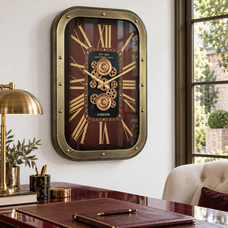 Horloge murale avec engrenages en mouvement de The The Gear, Doré