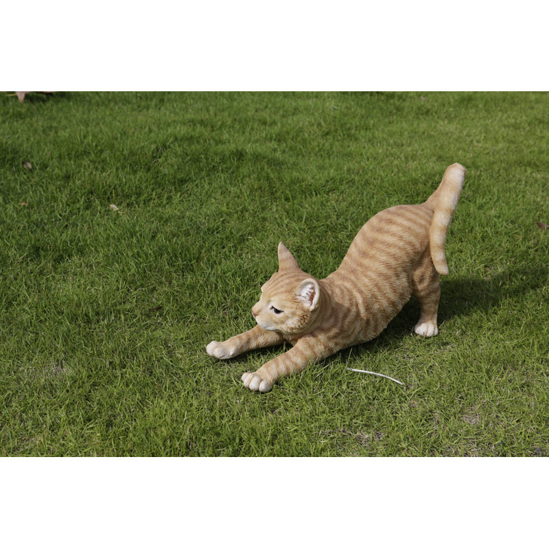 Statue de chat s'étirant, Orange