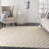 Tapis beige à motif géométrique Horley
