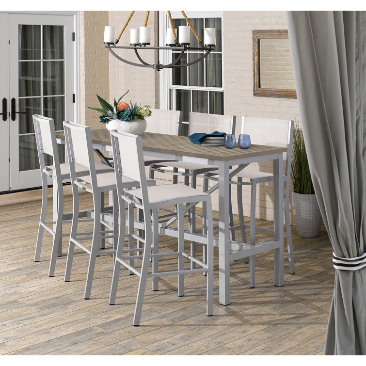 Travira 7-Piece Bar Table and Sling Bar Chair Rectangular Dining Set - 72"x30"