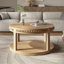 Table basse ronde avec plateau épaissi à deux niveaux, pieds robustes et motif perlé-1643753037