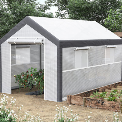 Serre de jardin 12 pi x 7 pi. Maison chaude d'extérieur blanche avec 4 fenêtres, 2 entrées avec fermeture à glissière et housse de protection contre les intempéries. Plantes d'éléments, structure stable