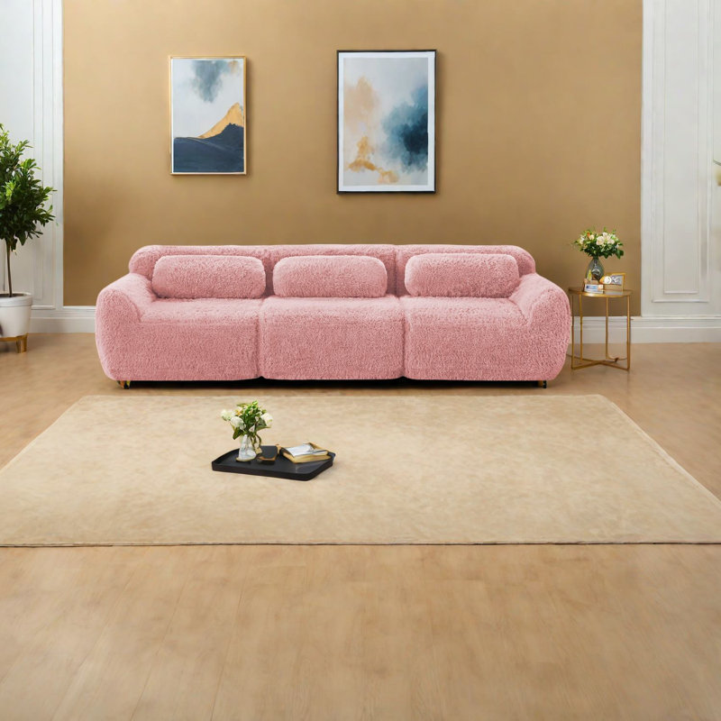 Canapé modulaire moderne en peluche rose avec design ergonomique pour le cinéma maison