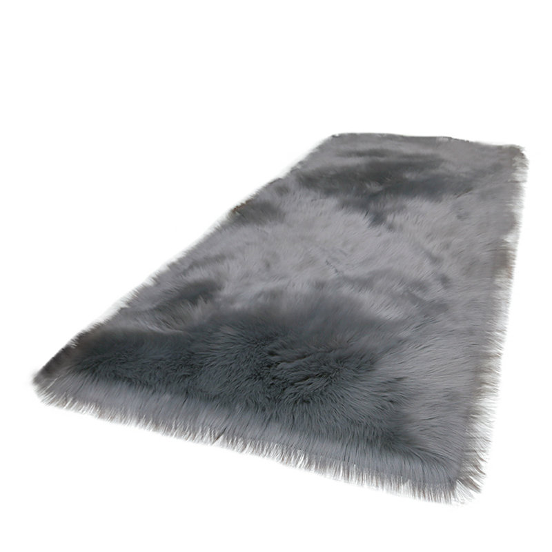 Hirsch Solid Colour Faux Sheepskin Standard Area Rug, Rectangle 100 x 180cm