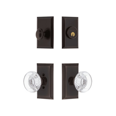 Nostalgic Warehouse Studio Entry Set with Round Clear Crystal Knob in Timeless Bronze
