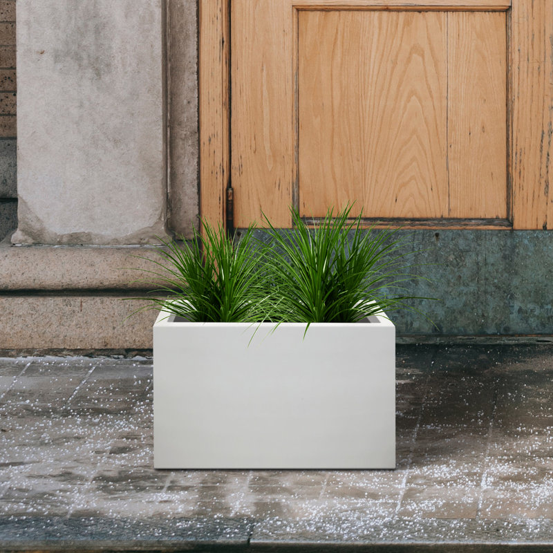 Pot à fleurs en béton