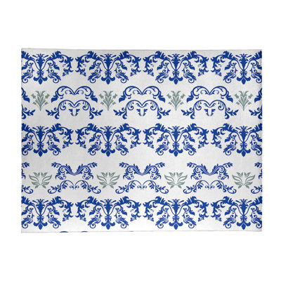 Tapis damassé blanc / bleu marine