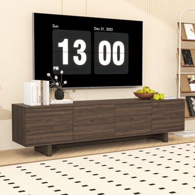 Meuble télé avec armoires à ouverture par pression, tablettes réglables et système de gestion des câbles