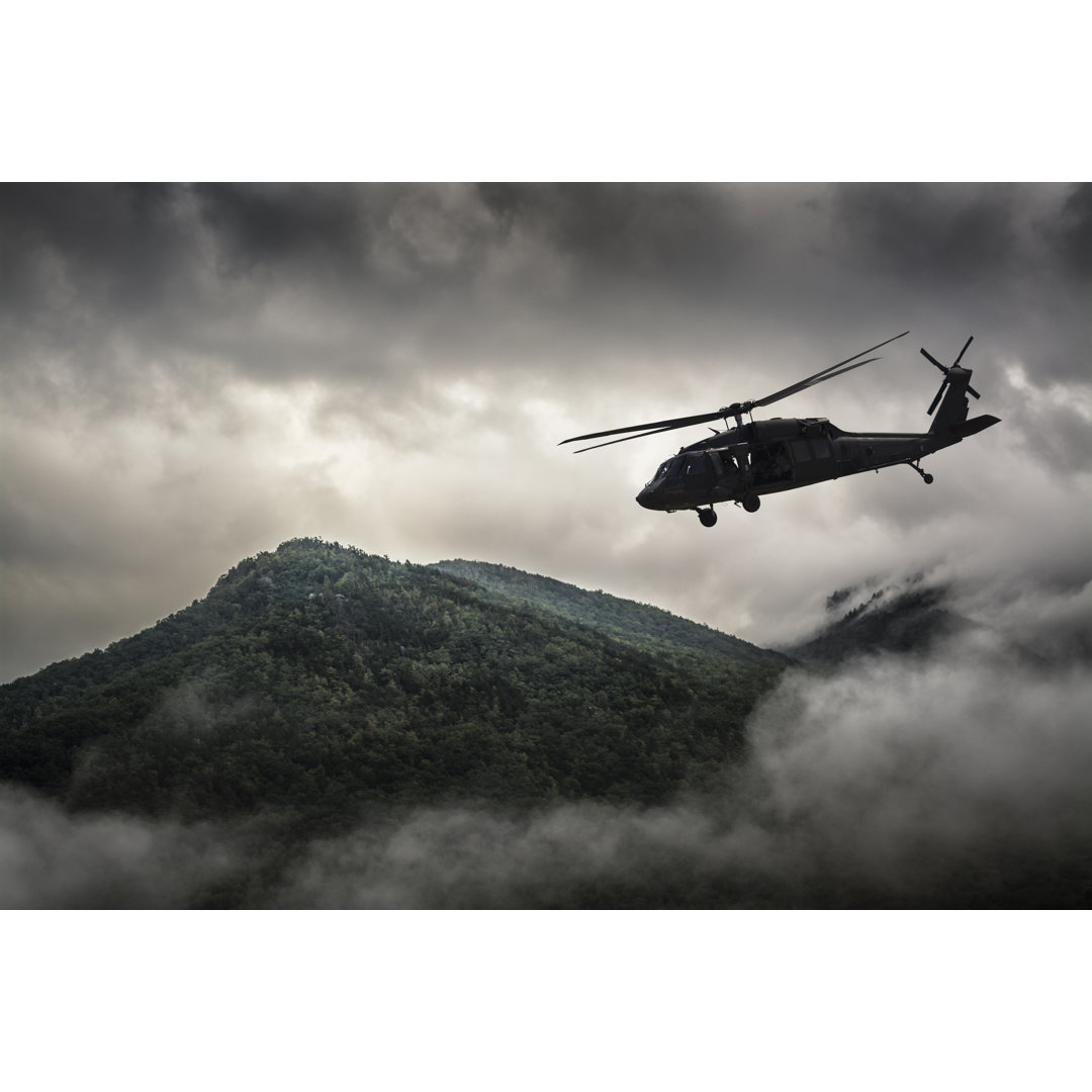 Helicopter Flying Over Mountain von NinjaMonkeyStudio - Leinwanddrucke