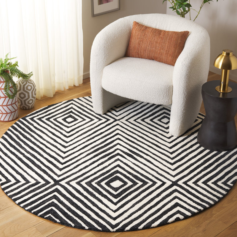 Joahan Geometric Hand Tufted Wool/Cotton Area Rug in Black/Ivory, Round 6'