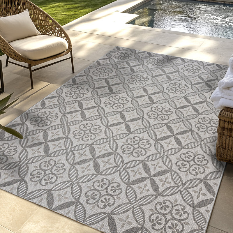 Tapis intérieur / extérieur en polypropylène tissé à plat et à carreaux ivoire Solterra Zilah