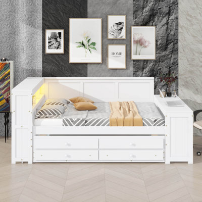 Full-Size Daybed With Drawers, Trundle Bed, Charging Spot, LED Lights, Workstation, And Storage Unit