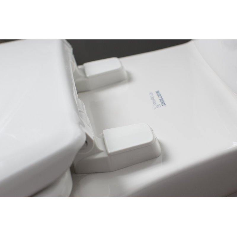 Siège de toilette rond en plastique