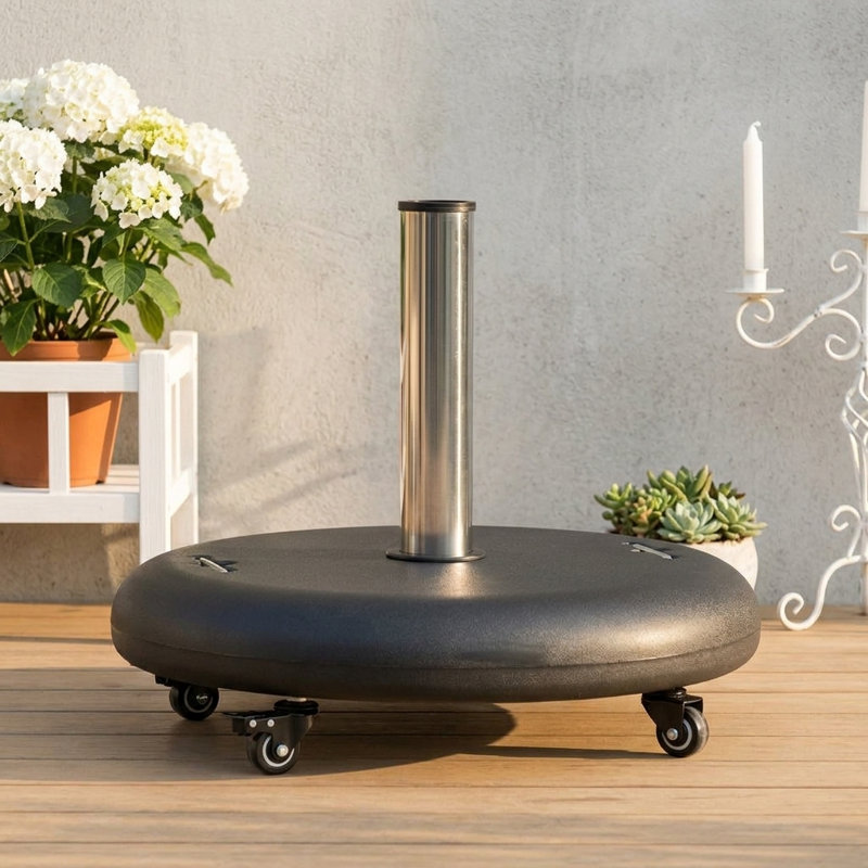 Base de parasol ronde équipée de roulettes pour la mobilité., Black