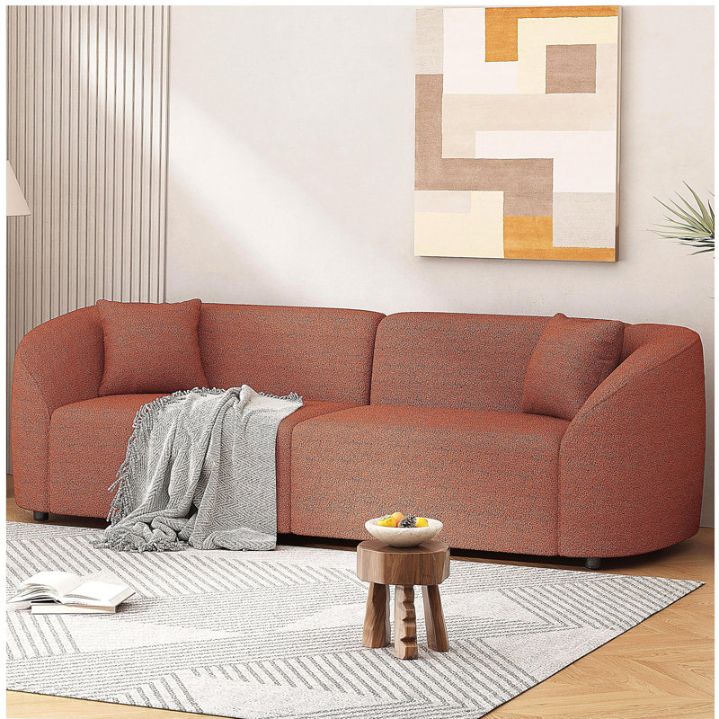 Kaori 87.5 in Mid-Century Modern Curved Upholstered Sofa, Orange Boucle