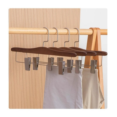 Cintre pour pantalons en bois massif avec pinces