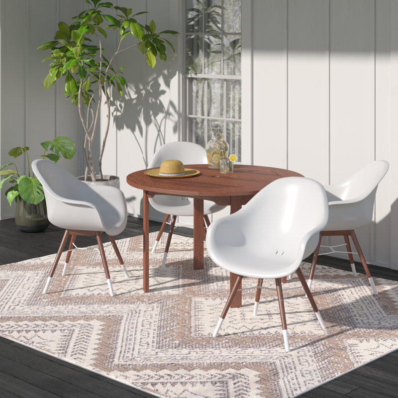 Anautica 4 - Person Wood Patio Dining Set with Round Table