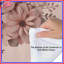 Édredon rose à motif floral-124117346