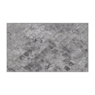 Tapis gris lavable à la machine