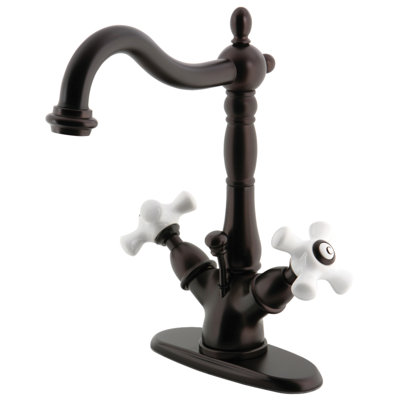 Kingston Brass Heritage Two-Handle 1-or-3 Hole Deck Mount Bathroom Faucet with Brass Pop-Up