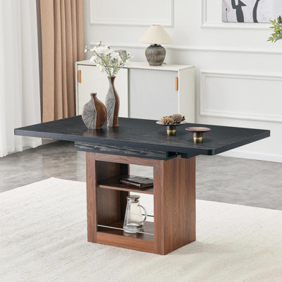 Une table de salle à manger extensible avec espace de rangement et une table de salle à manger extensible de 59 à 71 pouces. Table rectangulaire noire avec cadre en panneau de fibres à densité moyenne de couleur noyer pouvant accueillir 4 à 8 personnes.
