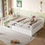 Lit de plancher avec tête de lit-961724679-961724676