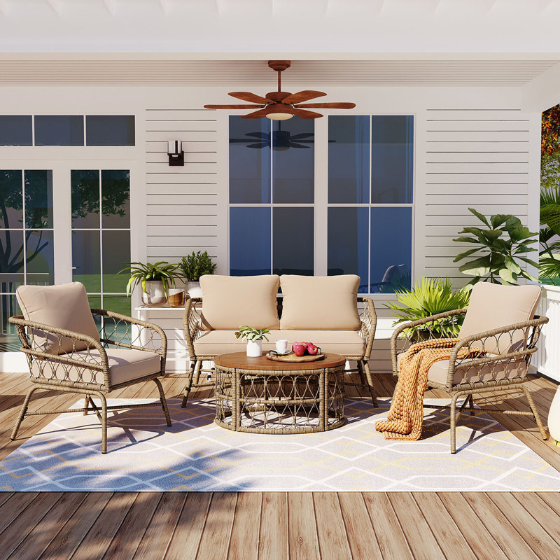 Noralf Acacia Wicker 4 - Person Patio Conversation Set with Cushions